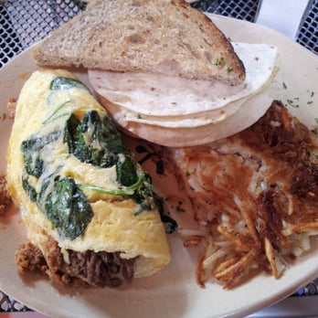 Snooze, an A.M. Eatery - Omelette with chorizo, spinach, and barbacoa. - Breakfast & Brunch Near Me - Phoenix, Arizona Snooze, an A.M. Eatery - Omelette with chorizo, spinach, and barbacoa. - Breakfast & Brunch Near Me - Phoenix, Arizona