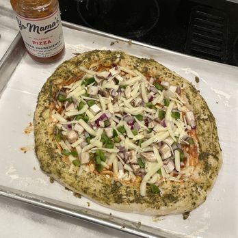 Yo Mama's Foods - Pizza prep! Made a supreme with pesto and ricotta in the crust. - Specialty Food Near Me - Clearwater, Florida Yo Mama's Foods - Pizza prep! Made a supreme with pesto and ricotta in the crust. - Specialty Food Near Me - Clearwater, Florida