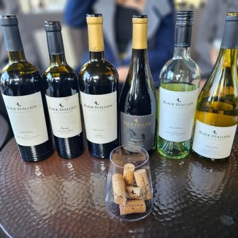 Black Stallion Estate Winery - wine bottles and corks on a table - Venues & Event Spaces Near Me - Napa, California Black Stallion Estate Winery - wine bottles and corks on a table - Venues & Event Spaces Near Me - Napa, California