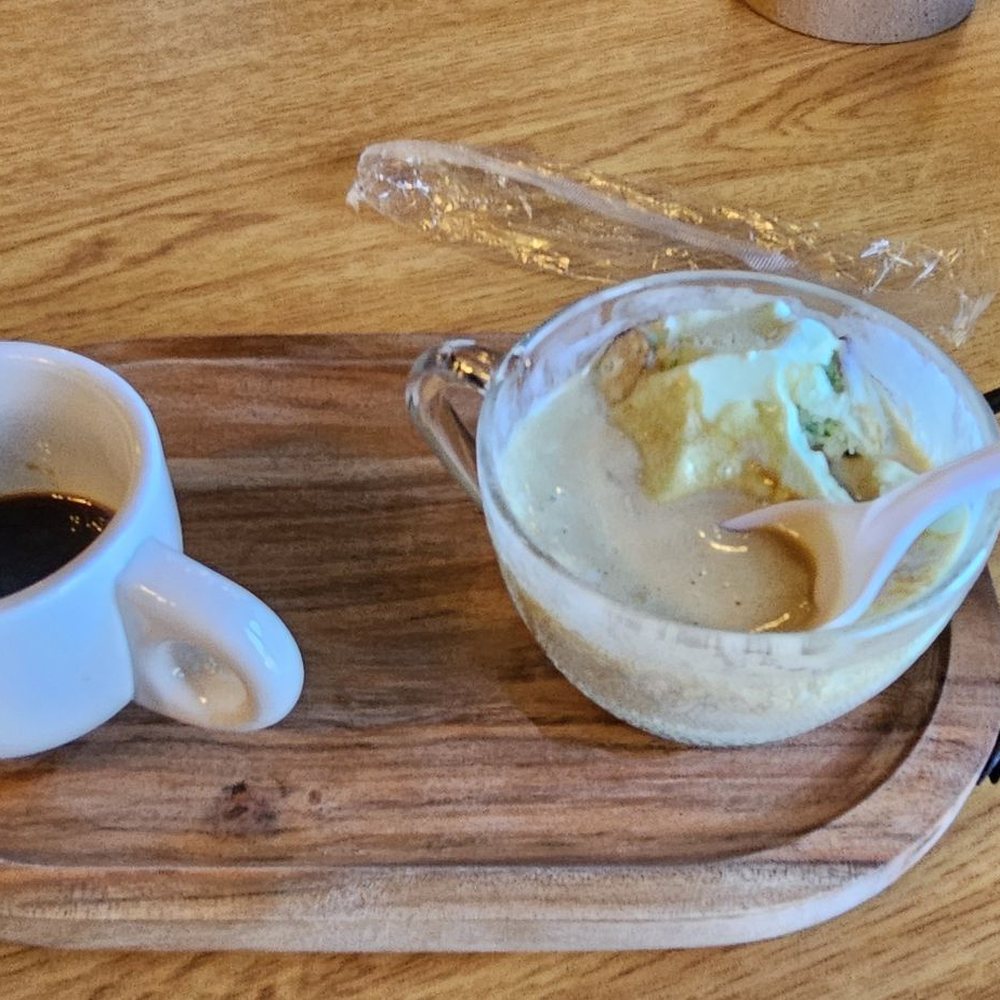 Pistachio almond affogato with the expresso on the side.