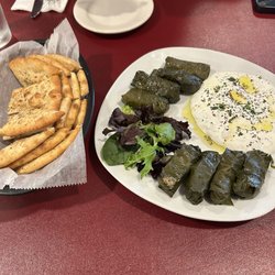 Grape leaves stuffed with Jasmine rice, home made tzatziki and crisp hot pita bread
