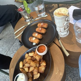 Suspiro - Patatas Bravas with sauce on the side Croquettas de Pollo - Spanish Near Me - San Jose, California Suspiro - Patatas Bravas with sauce on the side Croquettas de Pollo - Spanish Near Me - San Jose, California