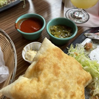 Tomasita's - Sopaipilla, red sauce and green sauce. - New Mexican Cuisine Near Me - Santa Fe, New Mexico