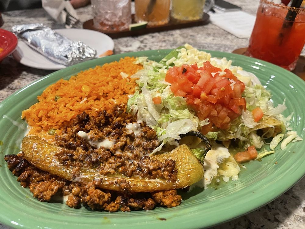 Delicias Fusion Kitchen & Bar Logo