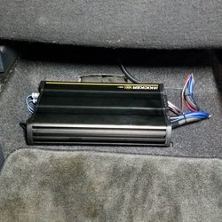 DC Audio - 2 channel Amp installed under passengers seat to maximize trunk space.