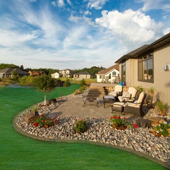 Precision Lawn & Landscape - a patio with seating area - Snow Removal Near Me - Fargo, North Dakota Precision Lawn & Landscape - a patio with seating area - Snow Removal Near Me - Fargo, North Dakota