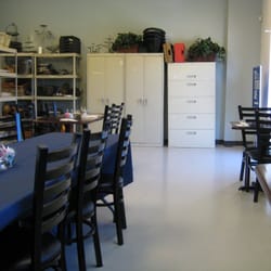 City Kitchen - Very tiny dining area, and apparently they store utensils here too.
