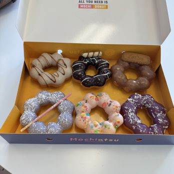 Mochiatsu St Augustine - Top- brown sugar milk tea, Nutella, coffee Bottom- taro, strawberry, ube - Donuts Near Me - St. Augustine, Florida