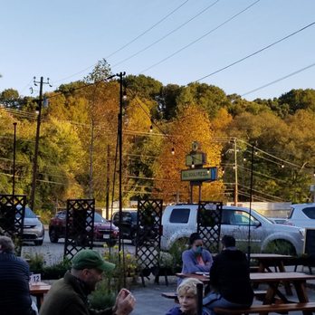 All Souls Pizza - Picnic seating with a peekaboo of the river arts district. - Pizza Near Me - Asheville, North Carolina All Souls Pizza - Picnic seating with a peekaboo of the river arts district. - Pizza Near Me - Asheville, North Carolina