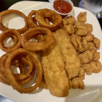 Overtime Sports Pub - Seafood Platter Flounder, Popcorn Shrimp and Onion Rings. - Sports Bars Near Me - Raleigh, North Carolina Overtime Sports Pub - Seafood Platter Flounder, Popcorn Shrimp and Onion Rings. - Sports Bars Near Me - Raleigh, North Carolina