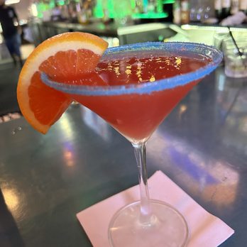 Market Station - a cocktail with a slice of orange on the rim - Bars Near Me - Galveston, Texas Market Station - a cocktail with a slice of orange on the rim - Bars Near Me - Galveston, Texas