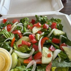 Barone Bros Pizza - This is how the outside of the restaurant looks I had a house salad and a pizza bread They were delicious