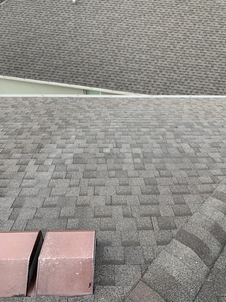 Slide of E&C Roofing and More