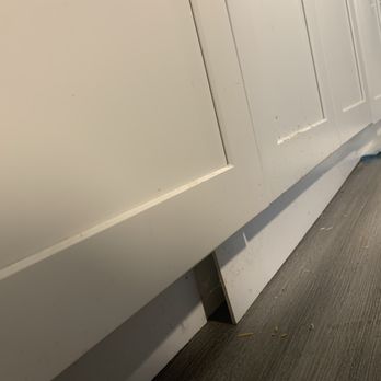 City Tile & Cabinets - Another loose board near the sink - Flooring Near Me - Anaheim, California
