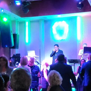 Crystal Palace Restaurant - a group of people dancing at a party - Russian Near Me - Englishtown, New Jersey