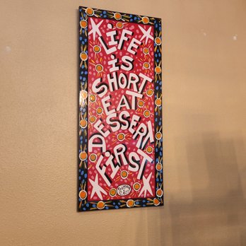 Wilson’s Commissary - a sign on a wall - Southern Near Me - Laurel, Mississippi