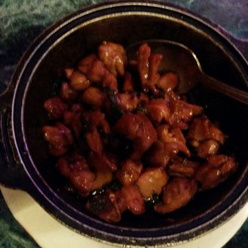 Mr. Chens Authentic Chinese Cooking - Basil chicken Hot pot. Chicken, cloves of garlic and fresh basil. Awesome - Chinese Near Me - Hoover, Alabama