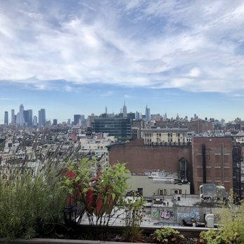 Happy Be - a view of a city from a rooftop garden - Cocktail Bars Near Me - New York, New York Happy Be - a view of a city from a rooftop garden - Cocktail Bars Near Me - New York, New York