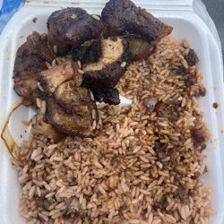 Donna's Caribbean Restaurant - All fat pieces of jerk pork that taste flavorless and old for $15!