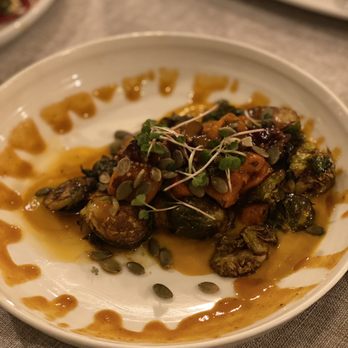 Benchmark - ROASTED SWEET POTATO + BRUSSELS SPROUTS, carrot ginger purée, pickled cranberries, mustard seeds, chipotle maple vinaigrette - New American Near Me - Santa Ana, California