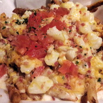 Crawfish Cave - Chowder Fries $9.95 - Crispy seasoned fries, bacon, tomatoes, cheese, clam chowder. Very good! Taste explosion - Cajun/Creole Near Me - Fullerton, California Crawfish Cave - Chowder Fries $9.95 - Crispy seasoned fries, bacon, tomatoes, cheese, clam chowder. Very good! Taste explosion - Cajun/Creole Near Me - Fullerton, California