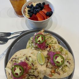 Fish tacos and açaí bowl and tropical iced tea.