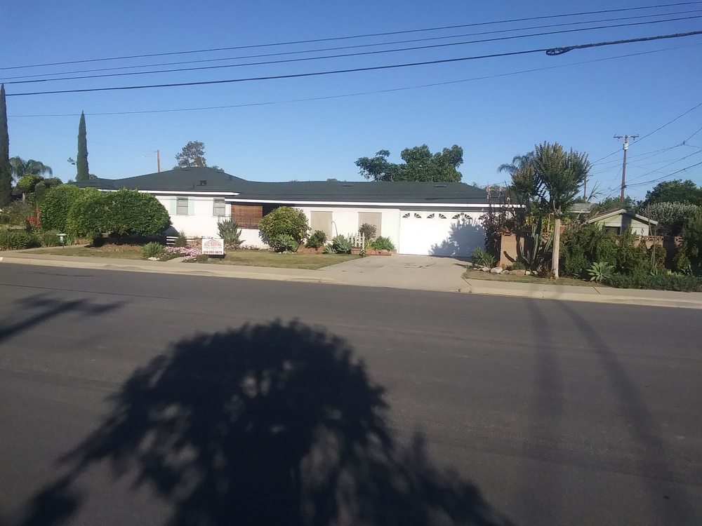 Slide of Ruiz Roofing Construction