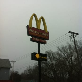 McDonald's - a mcdonald's drive thru sign - Burgers Near Me - Cedar Falls, Iowa