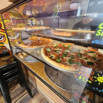 Zazas Pizzeria - So many slices to choose from - Pizza Near Me - Chicago, Illinois Zazas Pizzeria - So many slices to choose from - Pizza Near Me - Chicago, Illinois