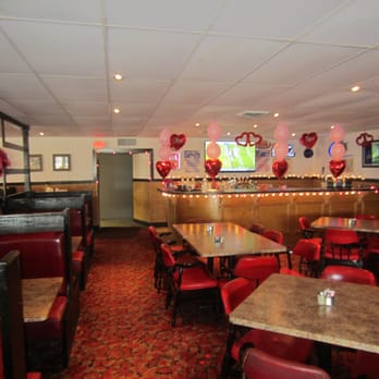 Oyster Bar - tables and booths with red chairs - Seafood Near Me - Harlingen, Texas Oyster Bar - tables and booths with red chairs - Seafood Near Me - Harlingen, Texas
