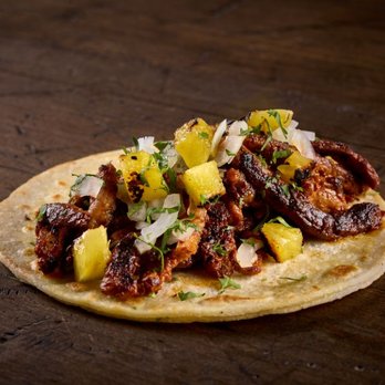 Taco Bamba - Spiced Pork and Pineapple, al pastor taco served on corn tortillas and topped with sliced onions and cilantro found on the me... - Tacos Near Me - Rockville, Maryland Taco Bamba - Spiced Pork and Pineapple, al pastor taco served on corn tortillas and topped with sliced onions and cilantro found on the me... - Tacos Near Me - Rockville, Maryland