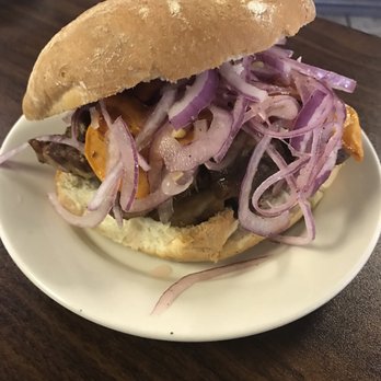 Tineo Peruvian Cafe - Fried Pork Slice Sandwich. Such a great deal at $5.99. - Peruvian Near Me - Richardson, Texas Tineo Peruvian Cafe - Fried Pork Slice Sandwich. Such a great deal at $5.99. - Peruvian Near Me - Richardson, Texas
