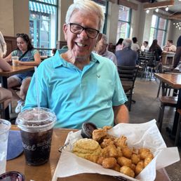 Husband with chicken tenders, biscuit and tots - yummy! Husband with chicken tenders, biscuit and tots - yummy!