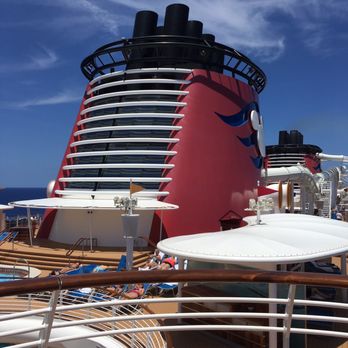 Disney Fantasy - View of the chimes from the adult deck. - Amusement Parks Near Me - Cape Canaveral, Florida Disney Fantasy - View of the chimes from the adult deck. - Amusement Parks Near Me - Cape Canaveral, Florida