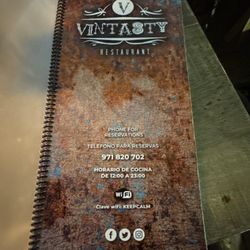 vintasty - Menu begins with artistry on the cover!