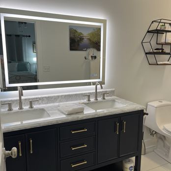 Little Inn on Main - His and hers vanity with backlit heated mirrors. - Hotels Near Me - Washington, North Carolina Little Inn on Main - His and hers vanity with backlit heated mirrors. - Hotels Near Me - Washington, North Carolina