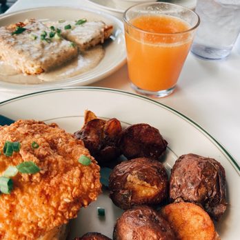 Phoebe's Diner - Chicken biscuit, half order of biscuits and sausage gravy, chicken wrap, and a blood orange mimosa. - Diners Near Me - Austin, Texas Phoebe's Diner - Chicken biscuit, half order of biscuits and sausage gravy, chicken wrap, and a blood orange mimosa. - Diners Near Me - Austin, Texas