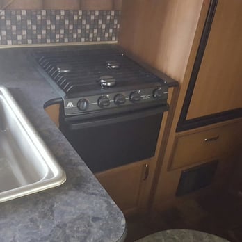 Hitch-N-Go RV Rental - Large kitchen with full size sink, 3 burner stove, and oven - RV Rental Near Me - Phoenix, Arizona