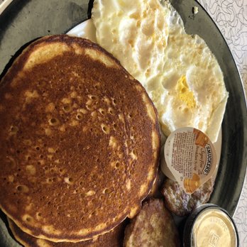 Honey Butter's Kitchen - Monticello - 2 medium well eggs with turkey sausage and corn cakes - American Near Me - Williamsburg, Virginia Honey Butter's Kitchen - Monticello - 2 medium well eggs with turkey sausage and corn cakes - American Near Me - Williamsburg, Virginia