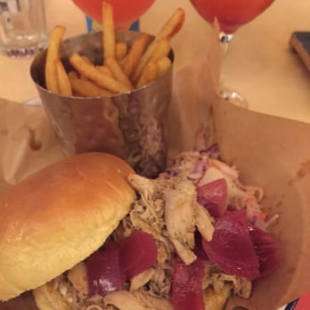 Turtle Bay - Pulled Chicken bun with fries and Caribbean slaw - Caribbean Near Me - Manchester, XGM Turtle Bay - Pulled Chicken bun with fries and Caribbean slaw - Caribbean Near Me - Manchester, XGM