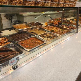 PhilHouse - a variety of food in a display case - Filipino Near Me - Long Beach, California PhilHouse - a variety of food in a display case - Filipino Near Me - Long Beach, California