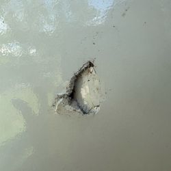 Hidden Oaks RV & Campground - Hole from piece of wood camp host did not try to pick up