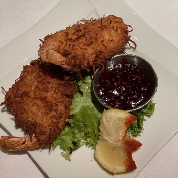 The Crown Room - a plate of fried shrimp with a side of sauce - New American Near Me - Albuquerque, New Mexico