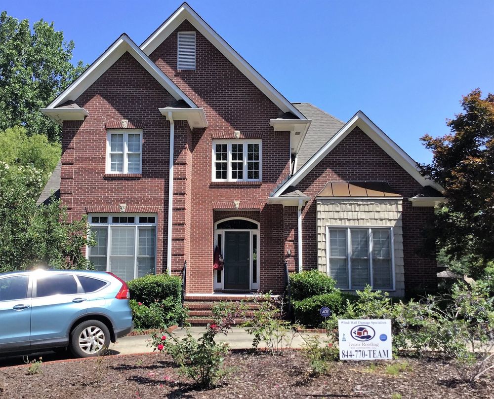 Slide of Team Roofing and Construction