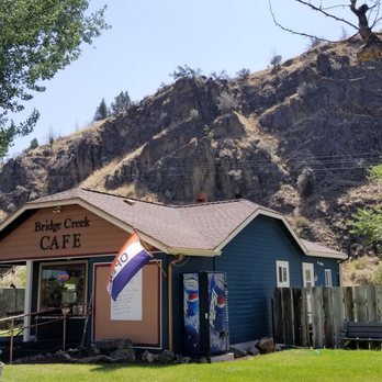 Bridge creek café - a small building with a mountain in the background - New American Near Me - Mitchell, Oregon Bridge creek café - a small building with a mountain in the background - New American Near Me - Mitchell, Oregon