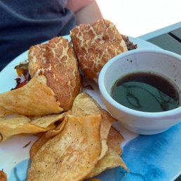 Awesome buns on Philly cheesesteak. Those homemade chips are tasty.