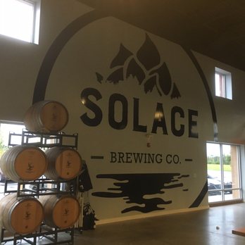 Solace Brewing Company - Logo on the back wall - Breweries Near Me - Sterling, Virginia Solace Brewing Company - Logo on the back wall - Breweries Near Me - Sterling, Virginia