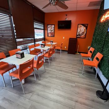 Peach Cobbler Factory- Collierville -  orange chairs and tables - Desserts Near Me - Collierville, Tennessee
