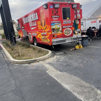 Birrieria Garcia - a red food truck parked in a parking lot - Tacos Near Me - Bakersfield, California Birrieria Garcia - a red food truck parked in a parking lot - Tacos Near Me - Bakersfield, California