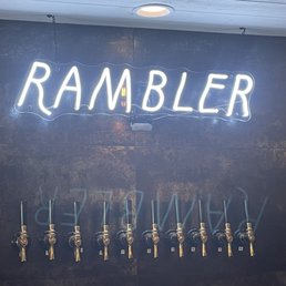 a row of beer taps a row of beer taps